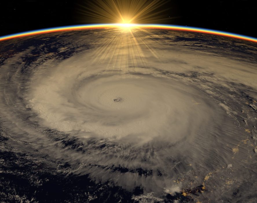 Hurricane visible above the earth, satellite view. Elements of t