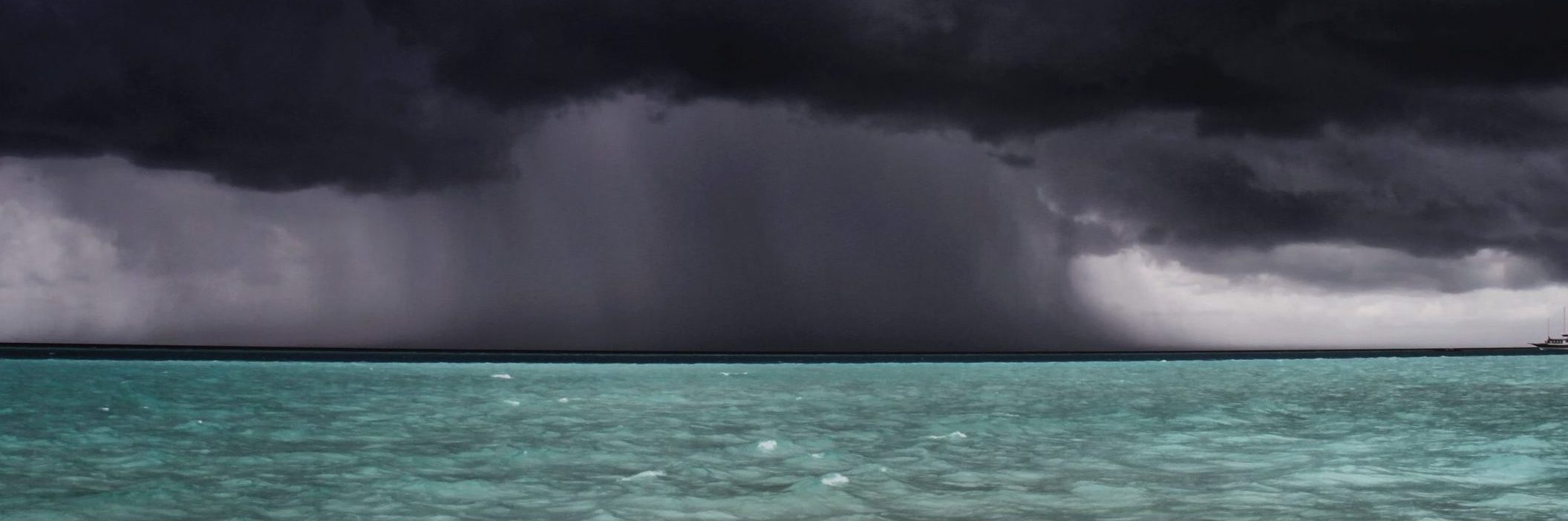Storm approaches boat, Maldives
